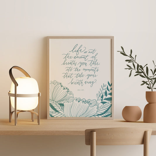 Framed art print of Hitch movie quote with blue floral drawing decor