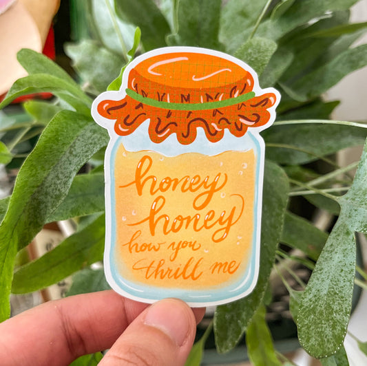 Honey jar sticker on a plant